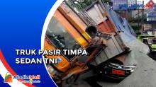 Diduga Kelebihan Muatan, Truk Pasir Timpa Sedan TNI di Jalan Alternatif Cibubur