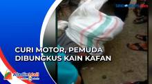 Pemuda Dihajar Massa dan Dibungkus Kain Kafan Karena Kerap Mencuri Motor di Bogor