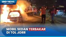 Ada Percikan Api, Mobil Sedan Hangus Terbakar di Tol JORR