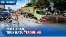 Akibat Pecah Ban, Truk Bermuatan Batu Terguling di Tebet, Jakarta Selatan