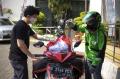 Pos Indonesia Gandeng GoJek Distribusikan Paket Sembako Bansos Kemensos