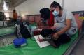Penerapan Protokol Kesehatan Penumpang Angkutan Laut di KM Doro Londa