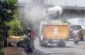 PMI Terus Lakukan Penyemprotan Disinfektan di Jalanan Jakarta