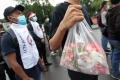 OKP Gelar Aksi Belasungkawa dan Tabur Bunga Terkait Penembakan di Tol Jakarta-Cikampek
