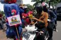 Gerakan Jakarta Bermasker, Polisi dan Super Hero Bagikan Masker dan Multivitamin