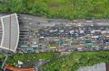 Imbas Penyekatan Larangan Mudik, Ribuan Kendaraan Terjebak Macet Hingga 8 KM di Pintu Tol Cikupa