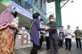 BPJamsostek Serahkan Bantuan Untuk Pekerja Migran Indonesia