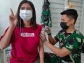 Serbuan Vaksinasi Massal dan Anak di Pangkalan TNI AU Sam Ratulangi