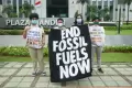 Aktivis Lingkungan Hidup Gelar Aksi Bersih-bersih Bank