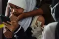 Vaksinasi Covid-19 Dosis Kedua untuk Anak di Palembang