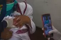 Vaksinasi Covid-19 Dosis Kedua untuk Anak di Palembang