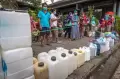 Antrean Panjang Pedagang Saat Operasi Pasar Minyak Goreng Curah Murah