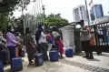 Tuntut Air Minum Layak, Warga Muara Angke Gelar Aksi Bawa Jerigen di Balai Kota Jakarta