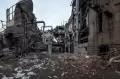Penampakan Kawah Bom di Kota Okhtyrka Usai Dibombardir Rusia