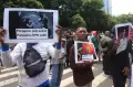 Massa Aksi Desak KPK Tangkap Lukas Enembe