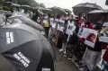 Aksi Pekerja Rumah Tangga Desak Jokowi Dukung Pengesahan UU PPRT