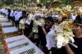 Melihat Prosesi 111 Jasad Dikremasi saat Ngaben Massal di Bali