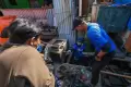 Aksi Pandawara Group Bersihkan Sampah di Kampung Nelayan Makassar