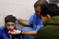 Ketegaran Anak-anak Palestina Menahan Sakit Akibat Serangan Udara Israel di Khan Younis