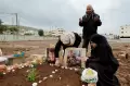 Pilu Hari Raya Ied di Gaza, Warga Ziarah ke Makam Kerabat yang dibunuh oleh Milter Israel