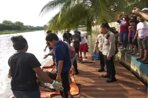 Mayat Perempuan Bertato Kupu-kupu Ditemukan Mengambang di Sungai Cisadane
